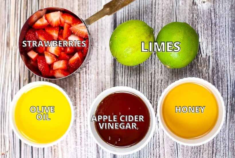 Ingredients labeled to make homemade strawberry vinaigrette with limes with text overlay.