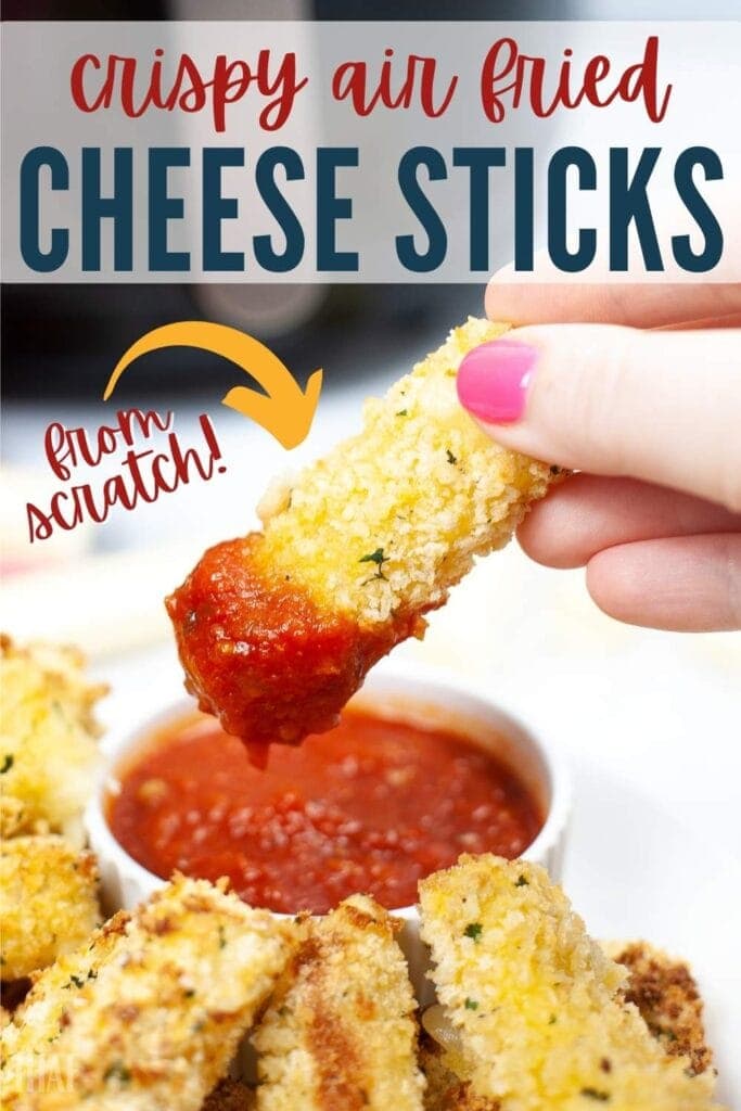 dipping an air fried mozzarella stick in marinara with text overlay