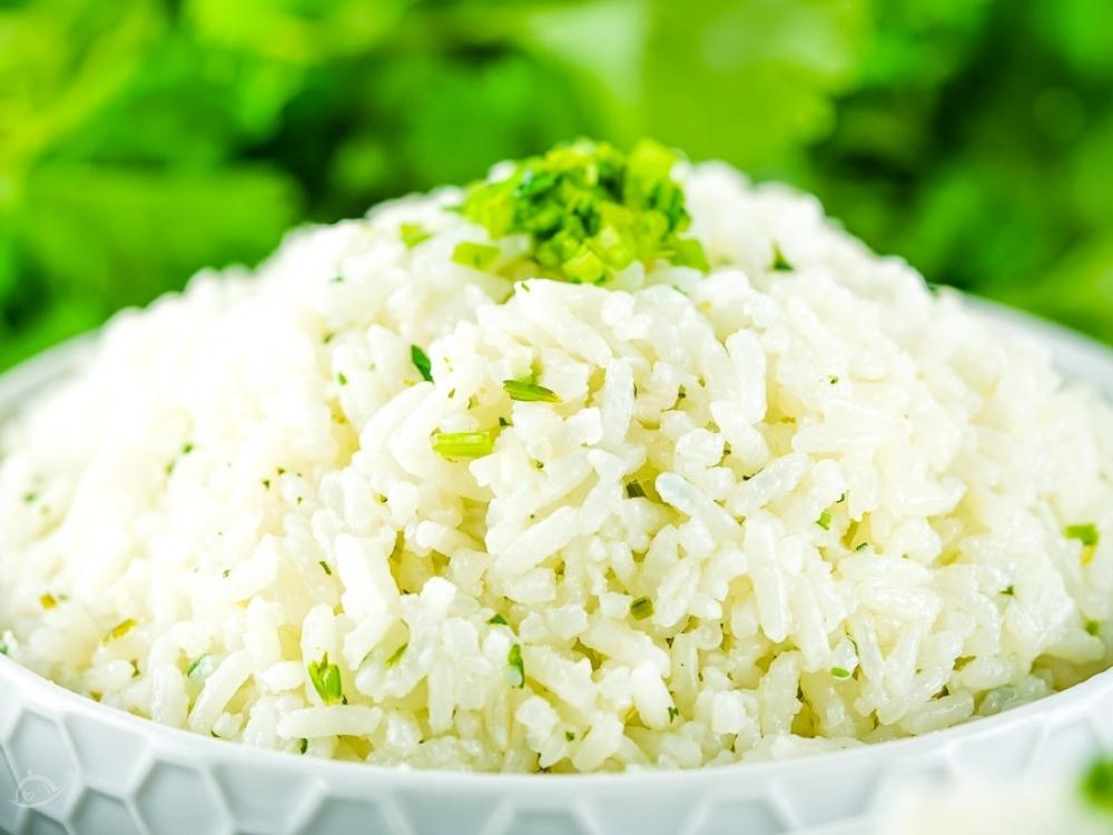 close up of instant pot cilantro lime rice topped with garnish