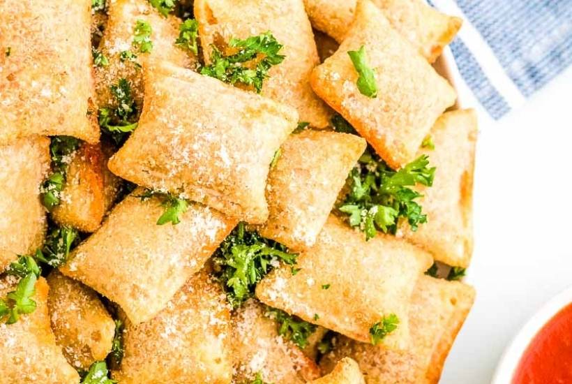 air fried frozen pizza rolls topped with parmesan cheese and parsley
