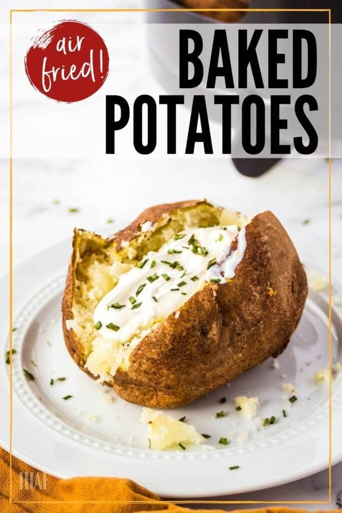 Baked potato with sour cream and chives on a white plate with graphic overlay