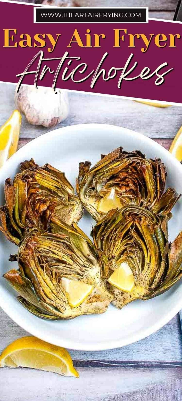 four air fried artichokes in a white bowl next to lemon wedges with text overlay
