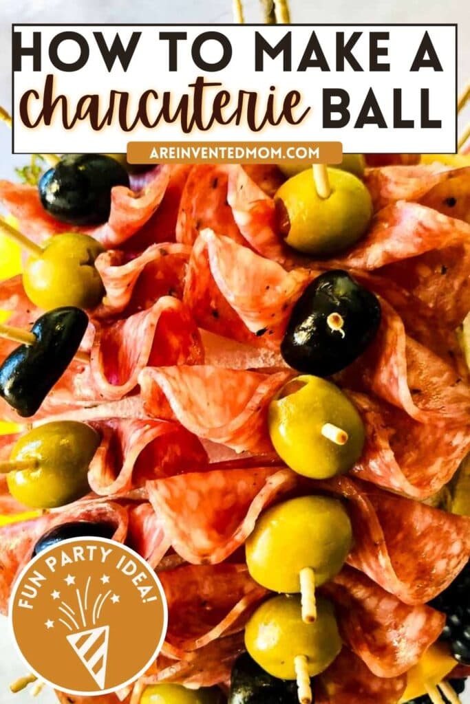 close up of a charcuterie ball with meat and olives with text overlay