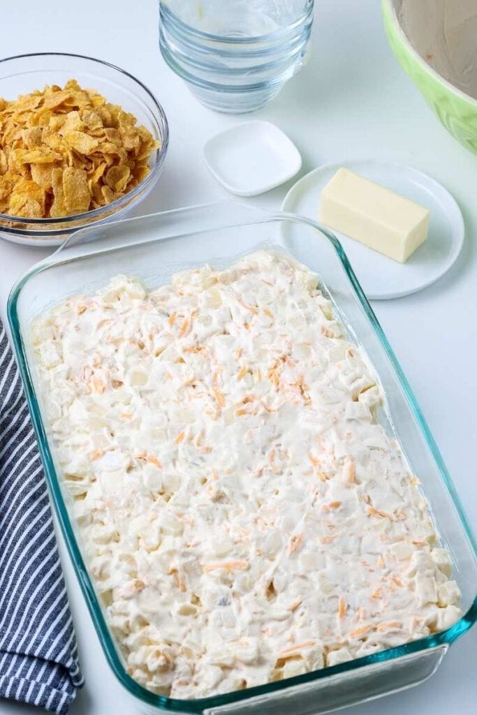 casserole dish of uncooked hashbrown casserole
