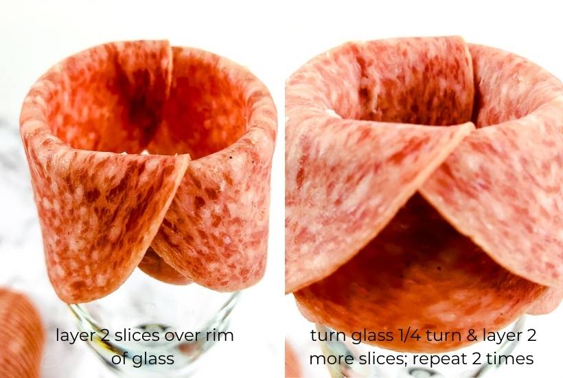 Draping layers of salami over a glass to make a charcuterie rose.