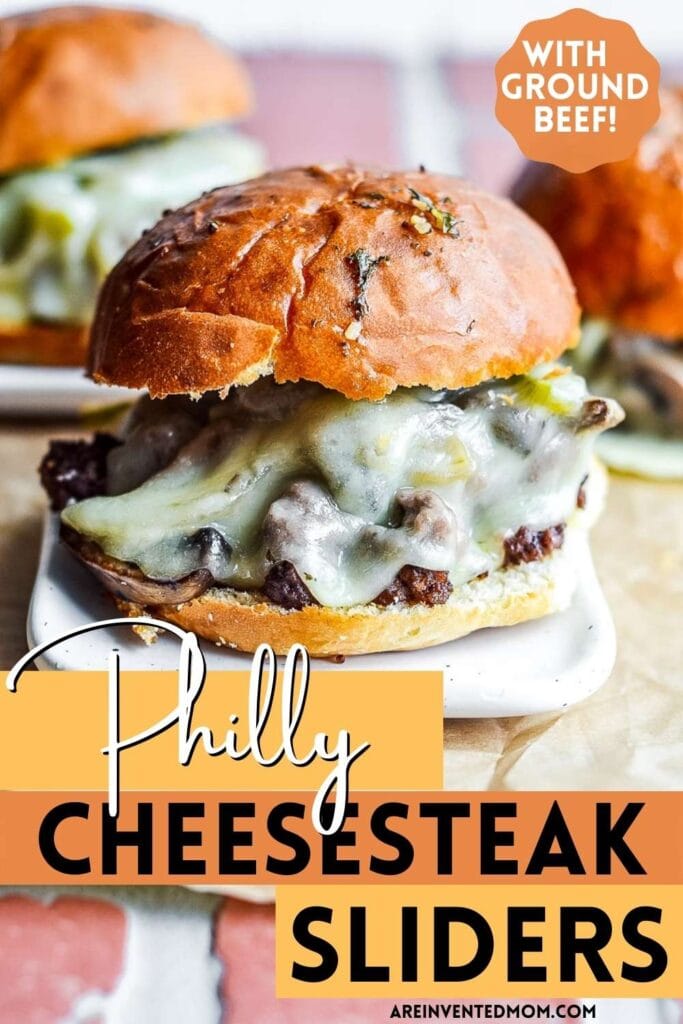 a ground beef Philly cheesesteak slider on a small white plate with text overlay