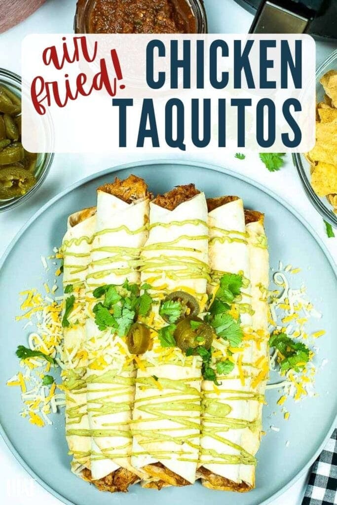 top shot of air fryer chicken taquitos topped with parsley and jalapenos with text overlay