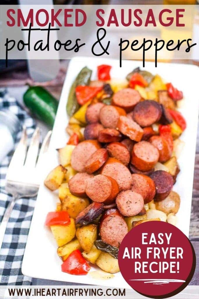 air fryer smoked sausage on a white platter with potatoes, peppers and onions with text overlay
