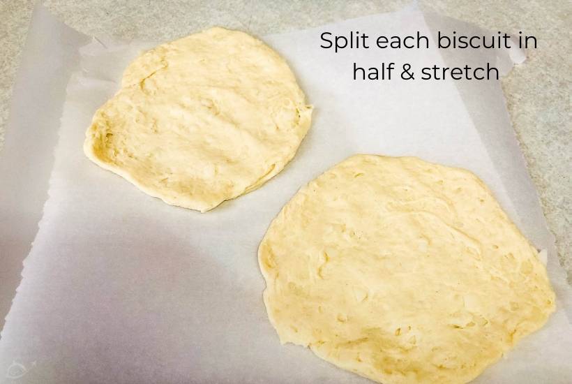 splitting a biscuit in half to make dough
