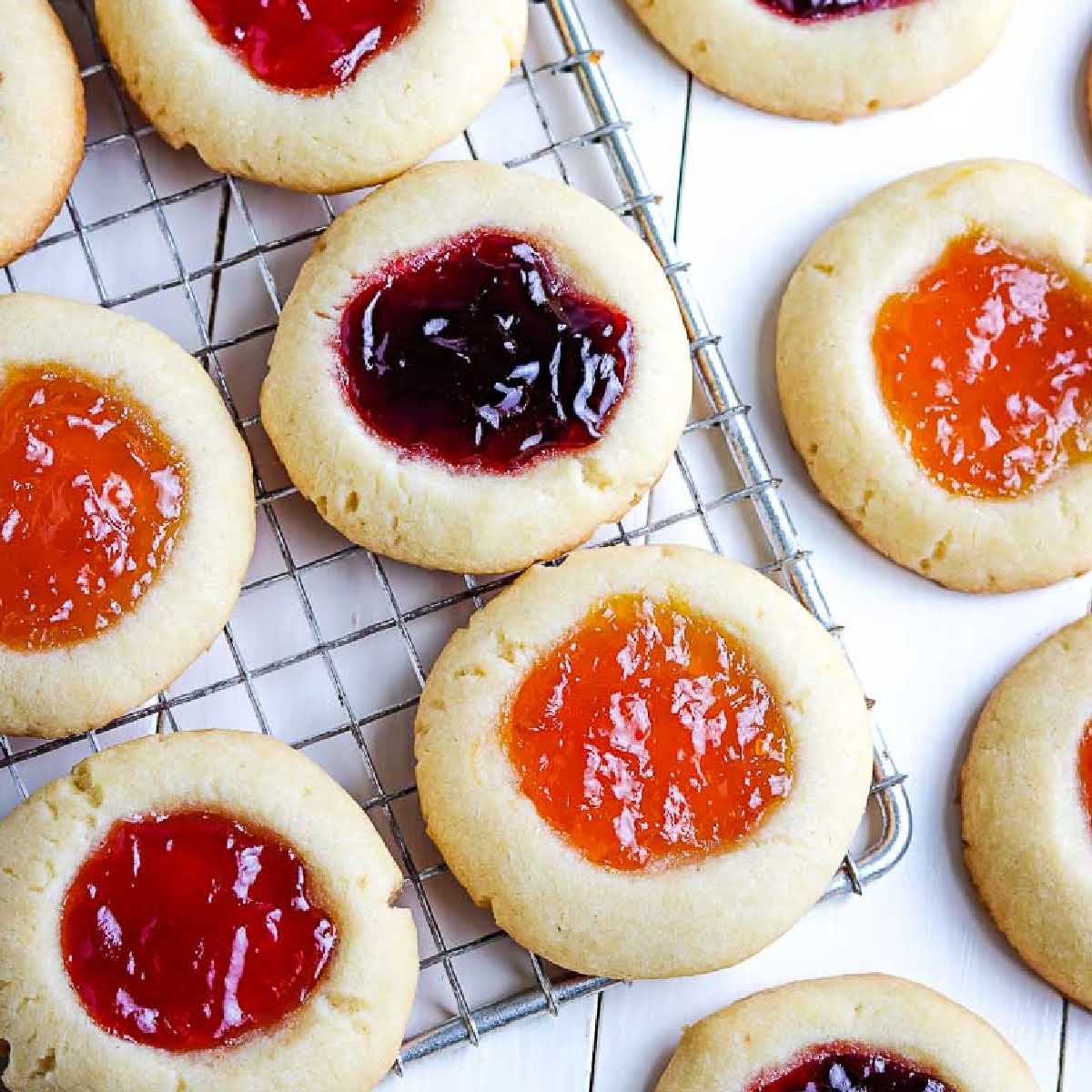 top view of strawberry jam cookies on a wire cooling rack