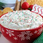 close up of little debbie christmas tree dip in a decorative holiday bowl