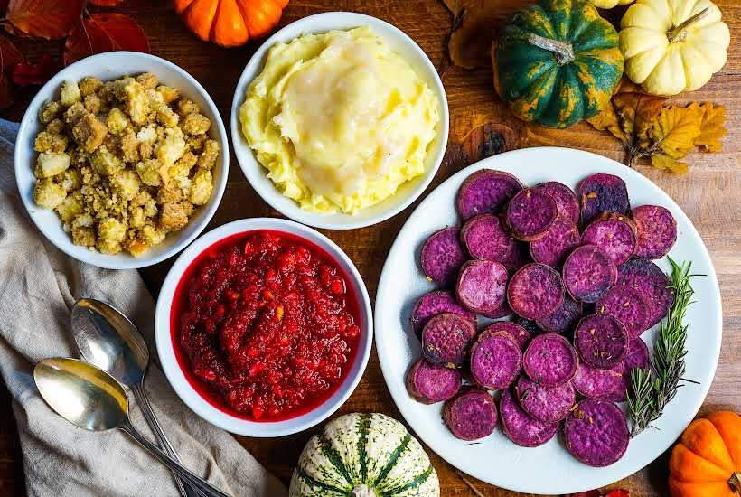 An assortment of vibrant foods in bowls.