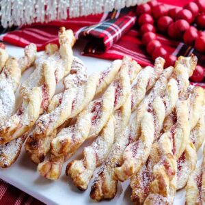 raspberry pastry twists on a white platter