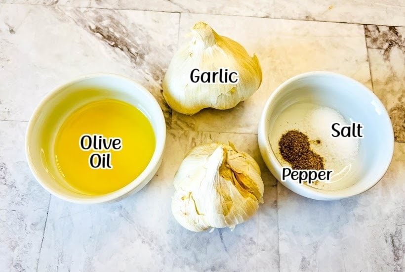 ingredients needed to make air fryer roasted garlic with text overlay