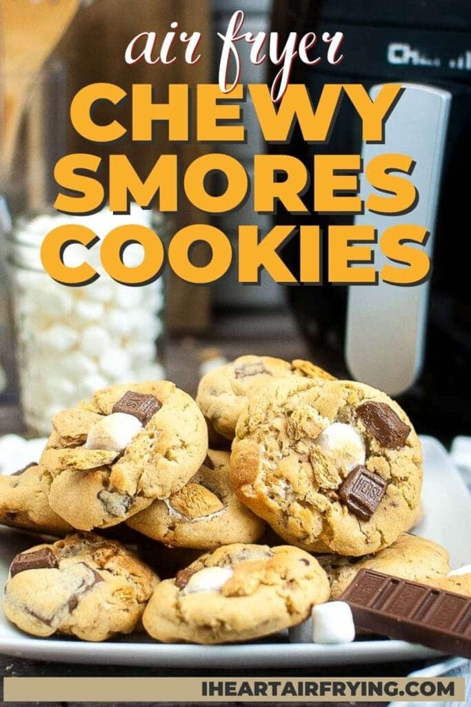 s'mores cookies on a plate with a jar of marshmallows and an air fryer in the background with text overlay.