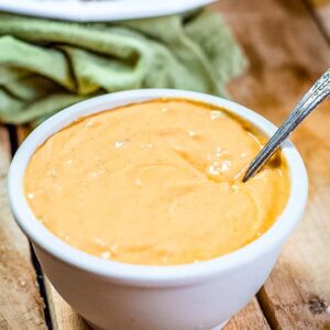 Close up of homemade big mac sauce with a spoon inserted.