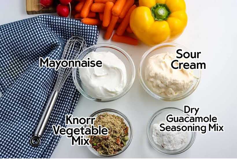 small bowls filled with ingredients to make creamy Knorr's vegetable dip with text overlay.