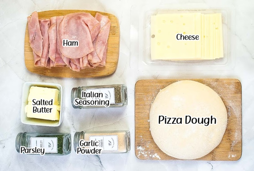 Labeled ingredients needed to make air fryer ham and cheese pinwheels with text overlay.