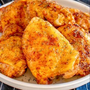 Southern Baked Chicken Thighs on a plate.