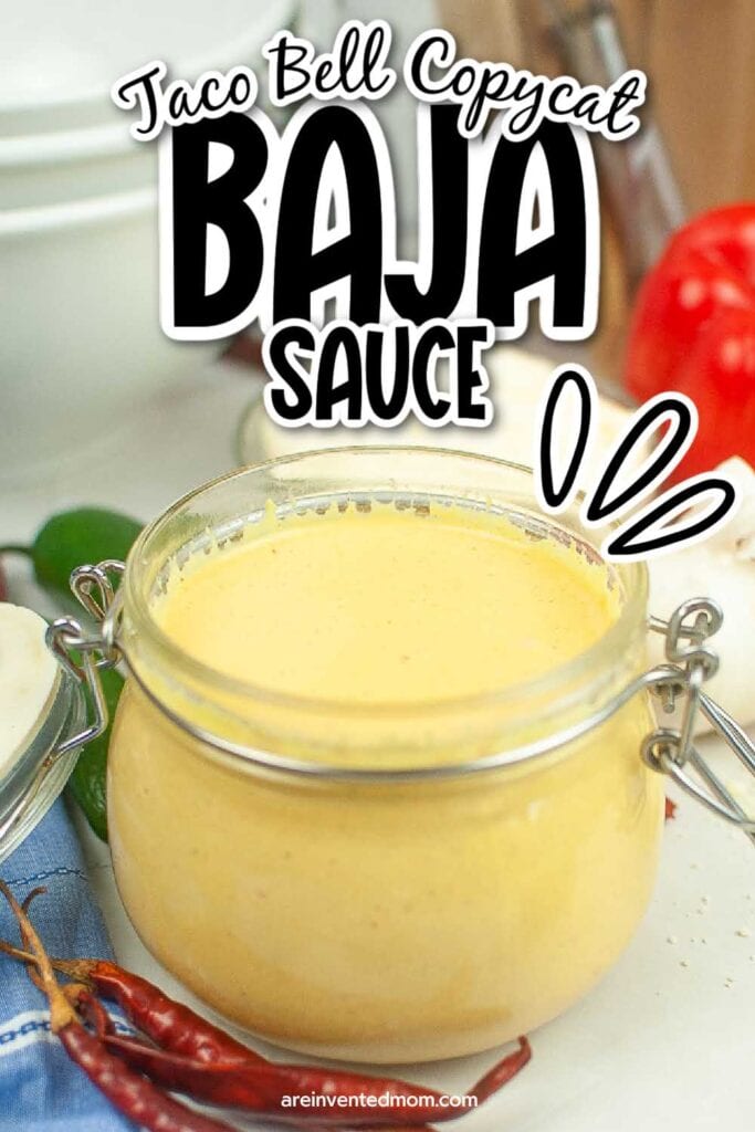 Closeup view of glass jar filled with Taco Bell copycat Baja sauce with text overlay.