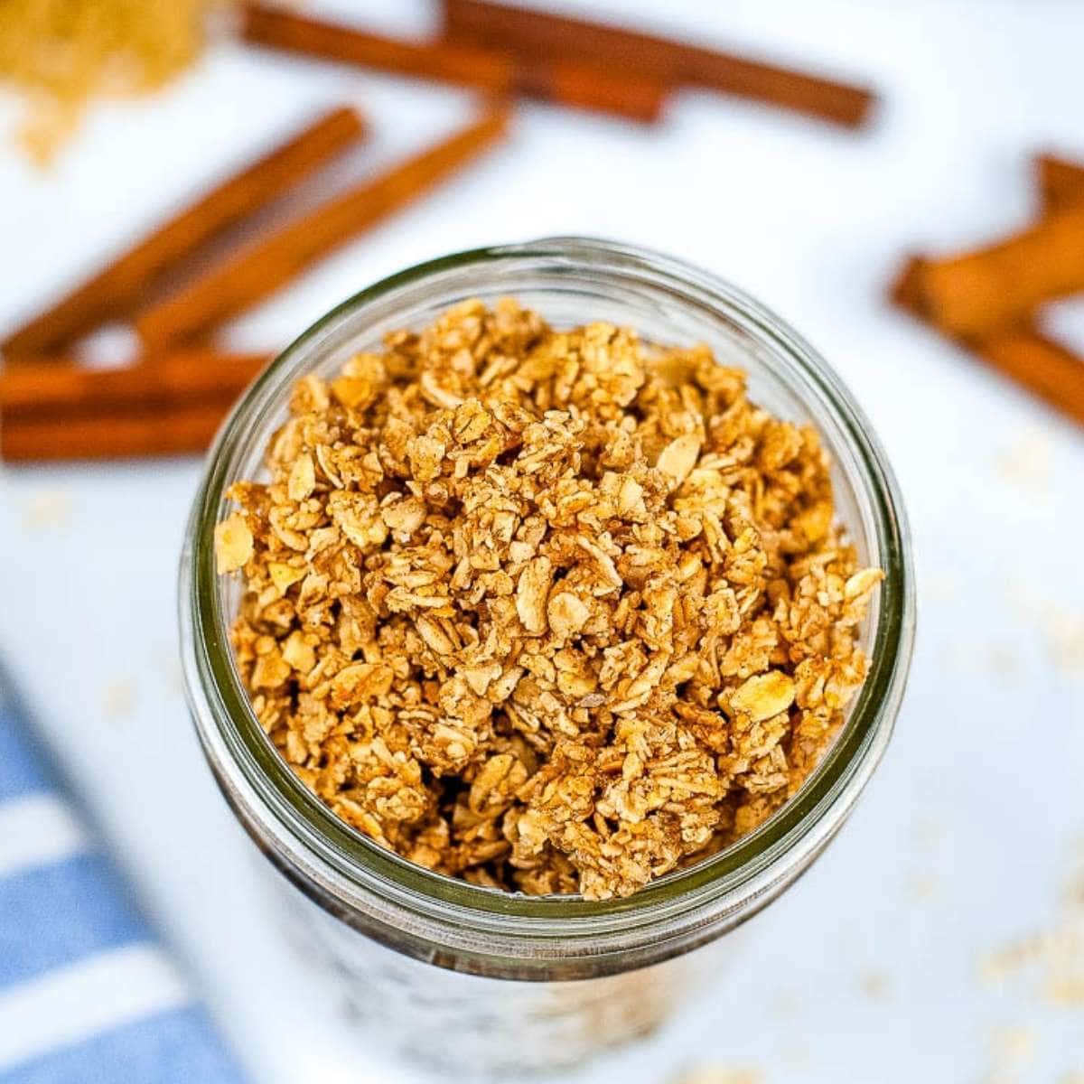 Overhead view of a jar of homemade air fryer granola.