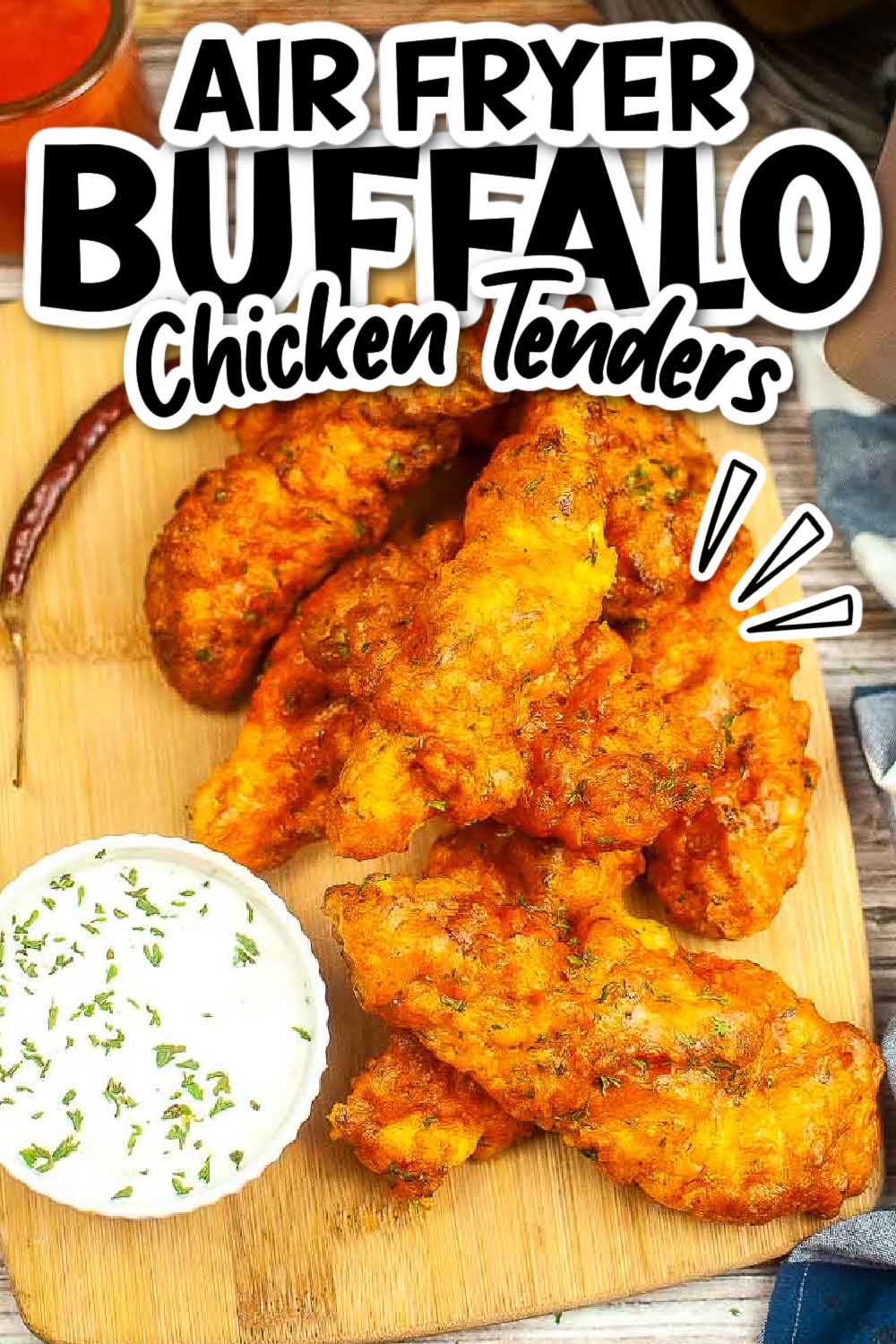 Air fryer buffalo chicken tenders stacked on a wooden board next to a bowl of dipping sauce with text overlay.