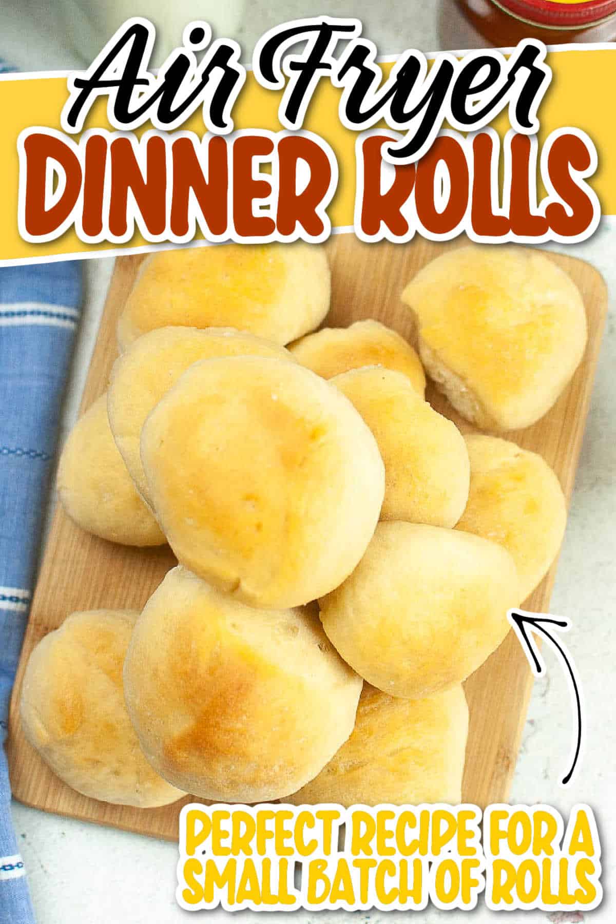 A stack of air fryer dinner rolls on a cutting board with text overlay.