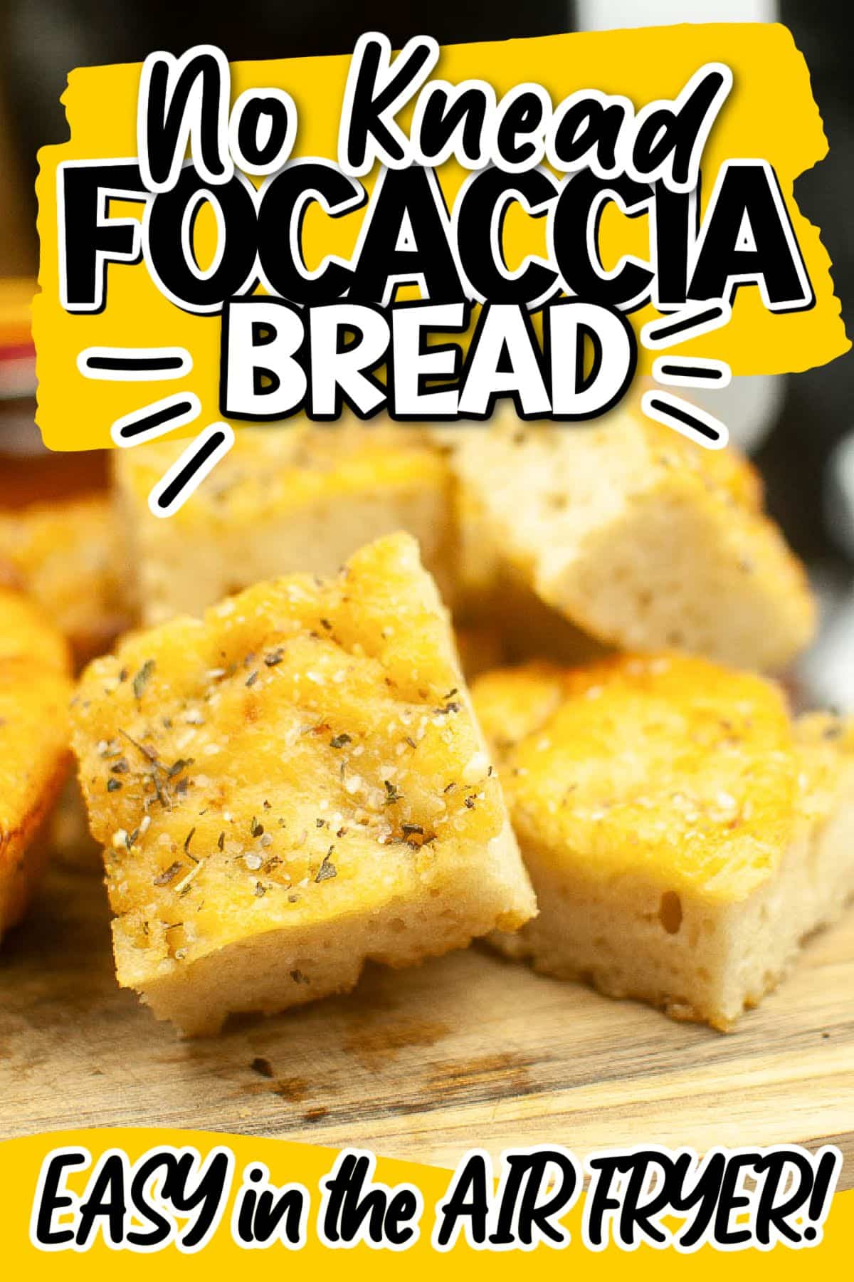 Air fryer focaccia cut into squares on a cutting board with text overlay.