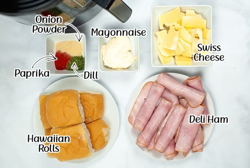 Ingredients needed to make air fryer ham and cheese sliders with text labels overlay.