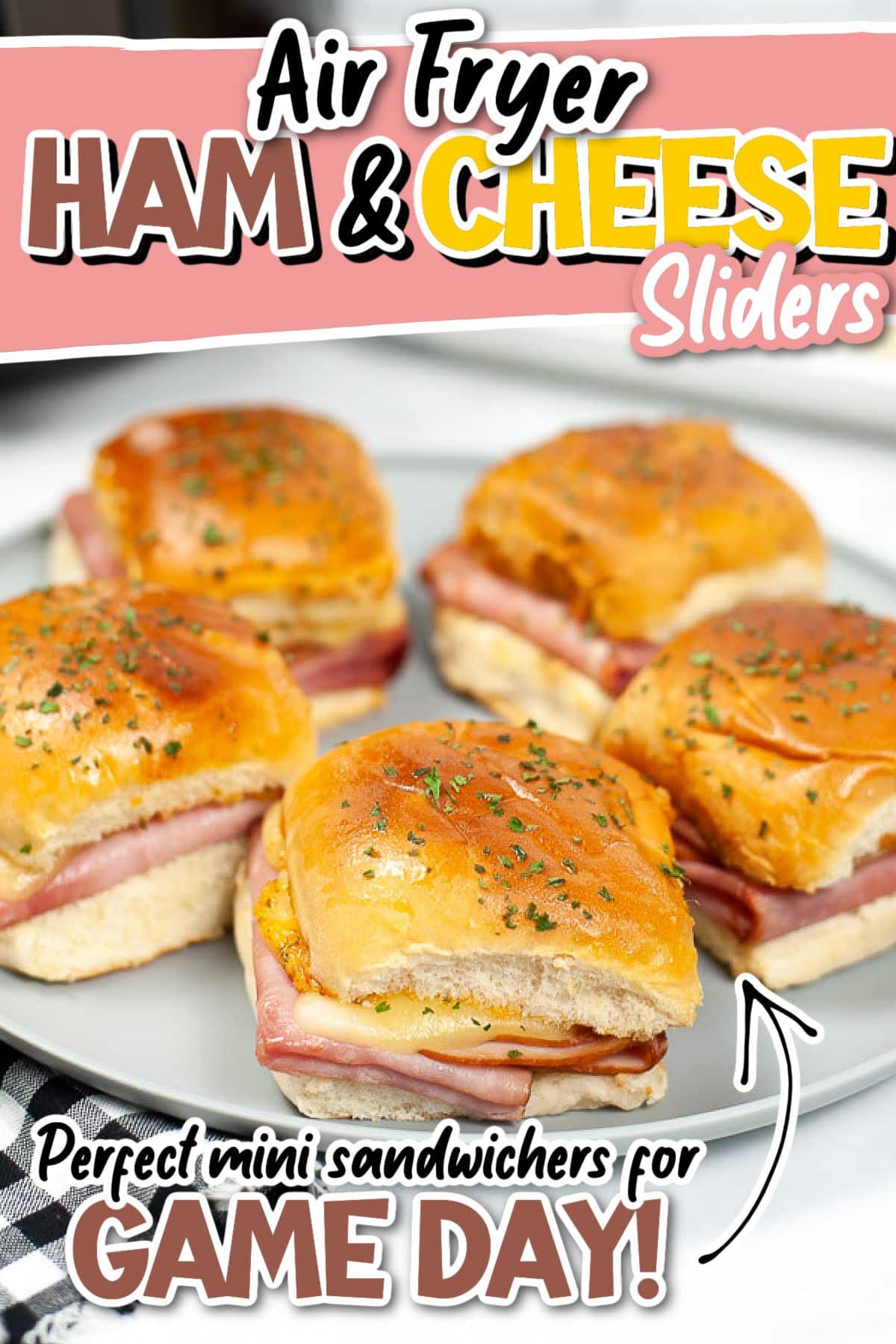Five air fried ham and cheese sliders on a plate with text overlay.