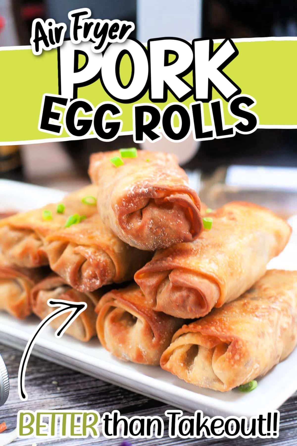 Front view of Air Fryer Pork Egg Rolls stacked on a plate with text overlay.