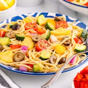 Front view of California Spaghetti Salad in a large bowl with a fork.