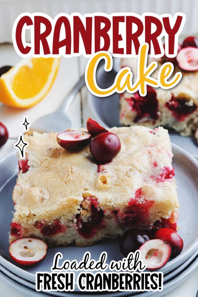 Closeup view of a slice of Cranberry Orange Cake on a gray plate with text overlay.