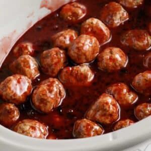 Close up of Crockpot Meatballs with Grape Jelly and BBQ Sauce.