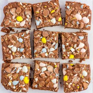 Overhead close up of Cadbury Mini Egg Brownies cut into squares.