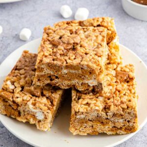 Front close up of Biscoff Cookie Butter Rice Krispie Treats on a plate.