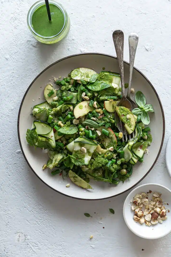 A bowl of zucchini ribbons made into a salad.