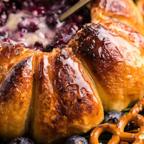 Blueberry and brie dip air fried in a puff pastry shell.