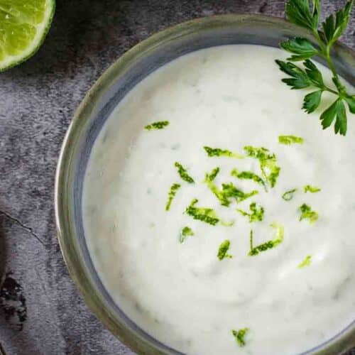 A bowl of lime crema sauce.