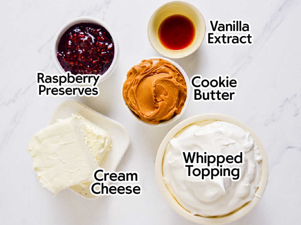 Ingredients to make raspberry cookie butter dip with text labels.