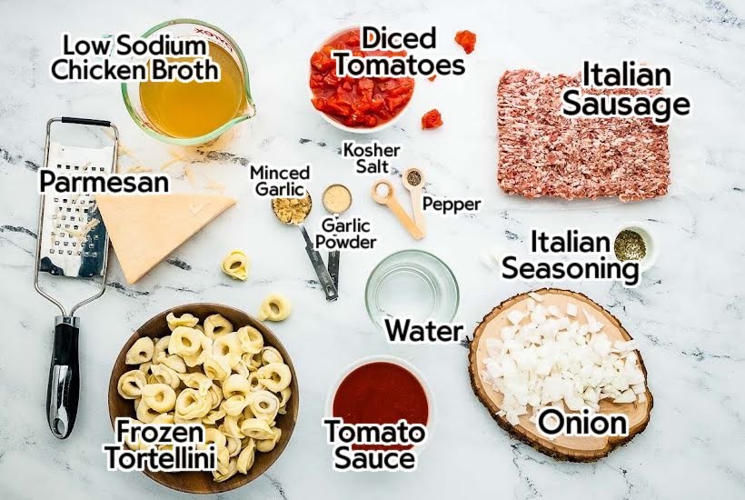 Ingredients to make sausage tortellini soup with text labels.