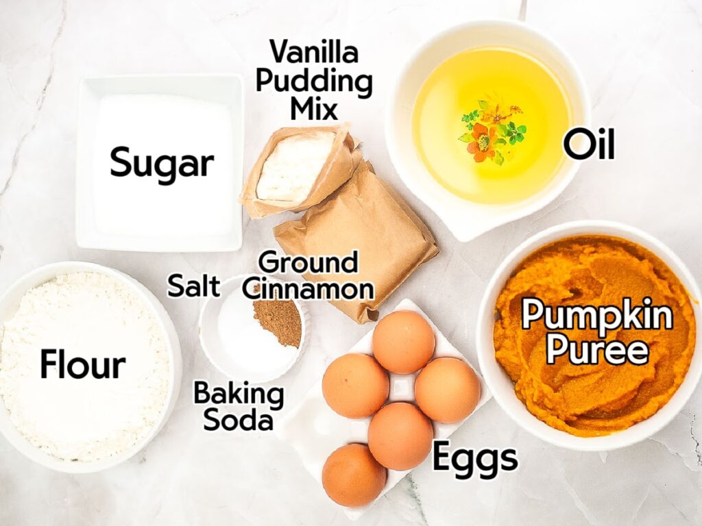 Ingredients to make spiced pumpkin bread with vanilla pudding recipe with text labels.