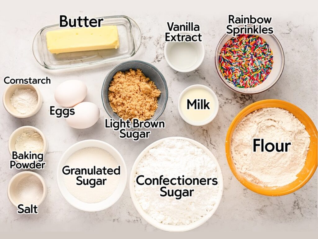 Ingredients needed to make frosted sugar cookie bars with text labels. 