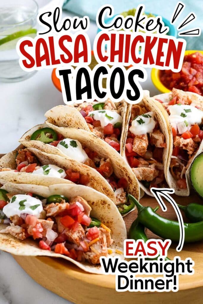 A wooden tray filled with slow cooked salsa chicken tacos garnished with sour cream with text overlay.