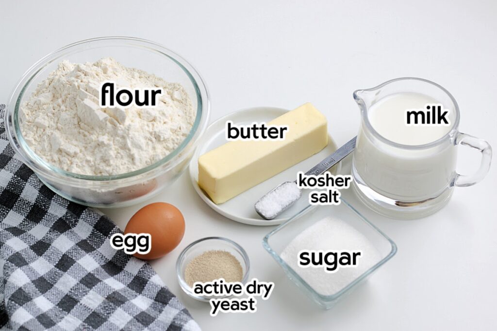 Ingredients needed to make homemade Texas Roadhouse rolls with yeast with text labels. 