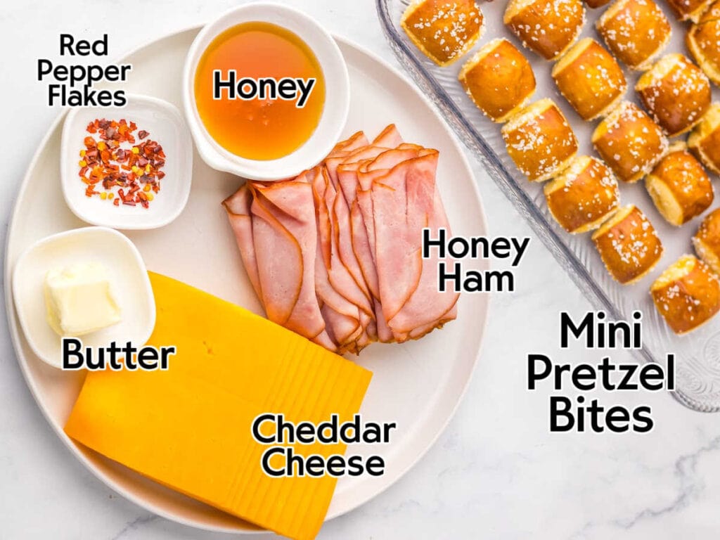 Ingredients to make ham and cheese pretzel bites recipe with hot honey.