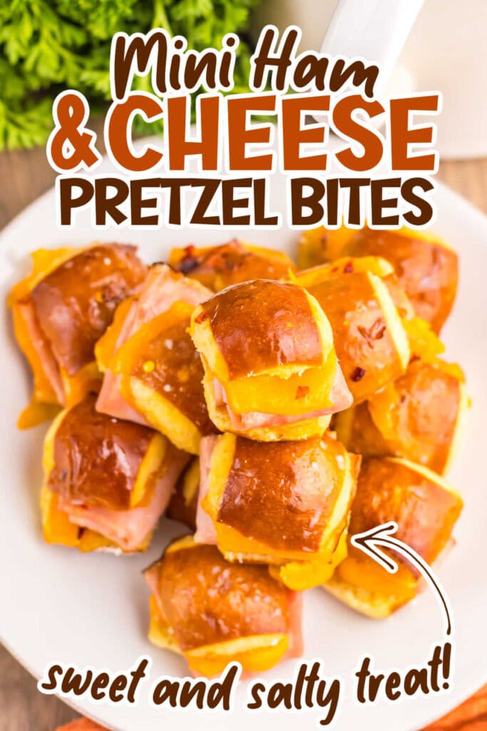 Overhead view of hot honey ham and cheese pretzel bites stacked on a plate with text overlay.