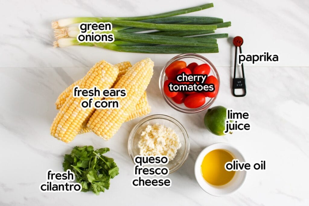 Ingredients needed to make the charred corn salad recipe with text labels.