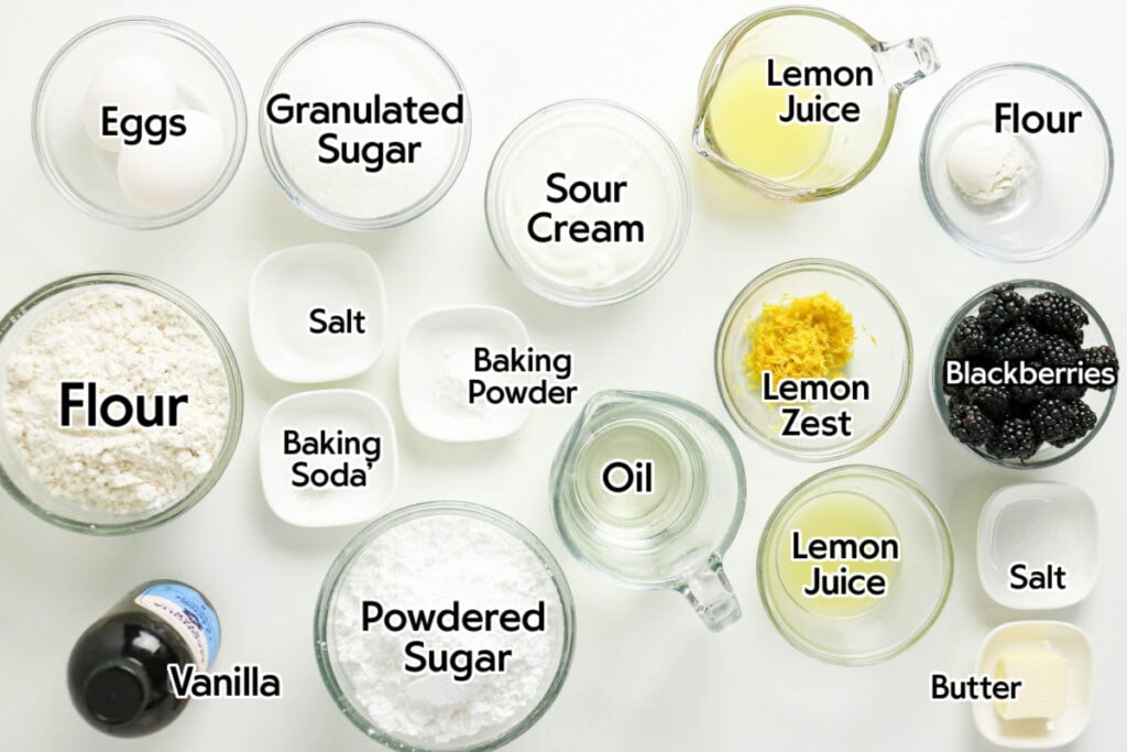 Ingredients needed to make the lemon blackberry loaf recipe with text labels.