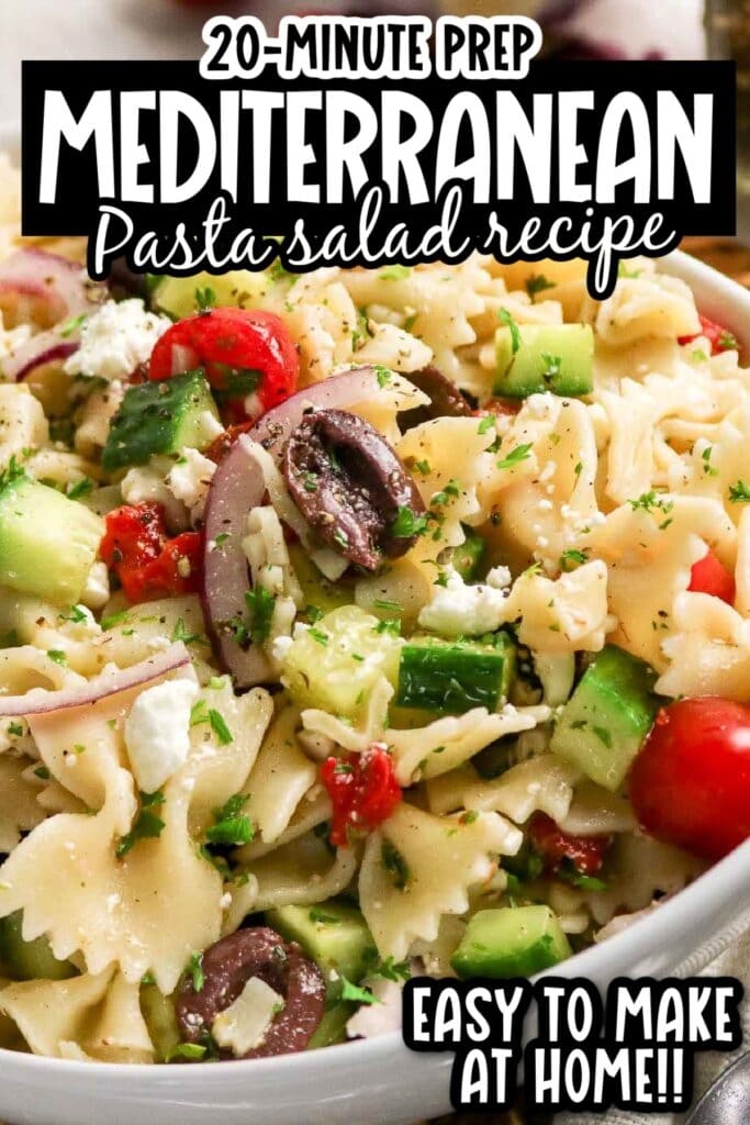 Closeup view of the easy Mediterranean pasta salad in a white bowl with text overlay.